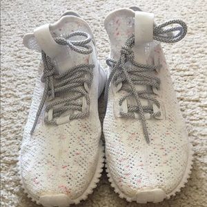 Adidas Tublar with red specs